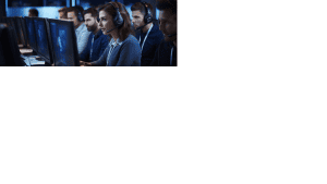 Contact center agents work to handle customer service inquiries at a large corporation